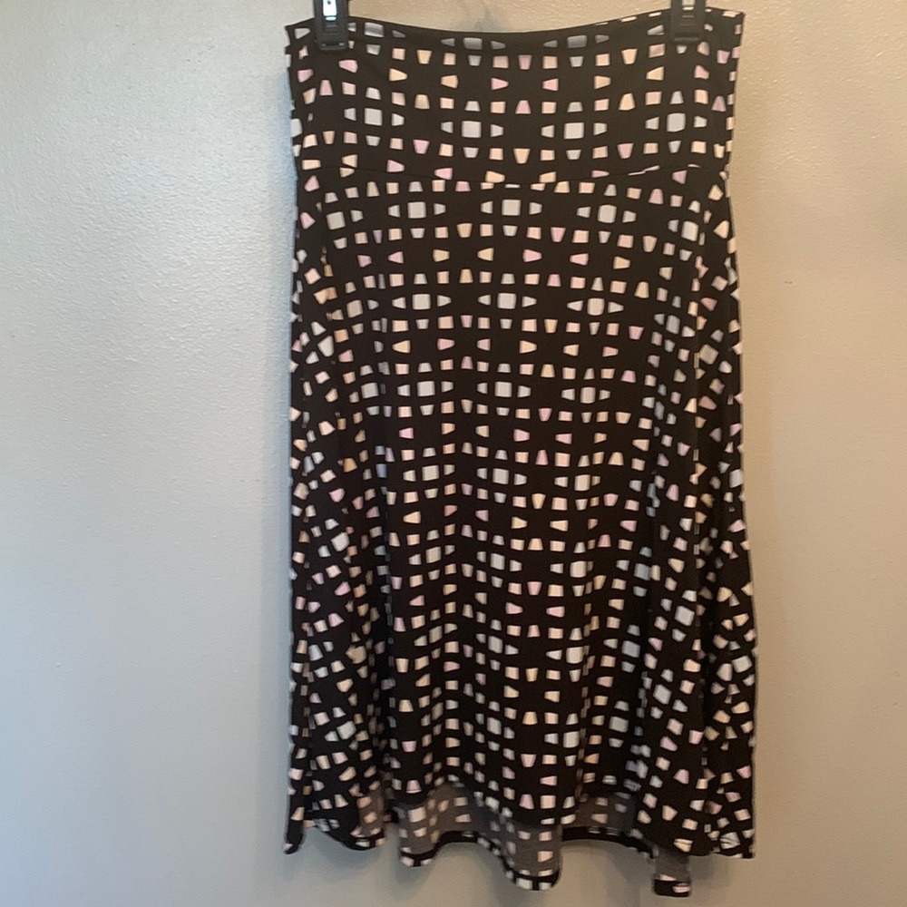 LuLaRoe M skirt black with faint watercolor color blocks in pink blue and yellow